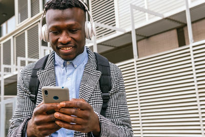 Young man using mobile phone