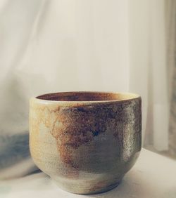 Close-up of coffee cup on table