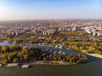 High angle view of river amidst buildings in city