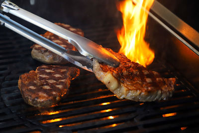 Close-up of meat on barbecue grill