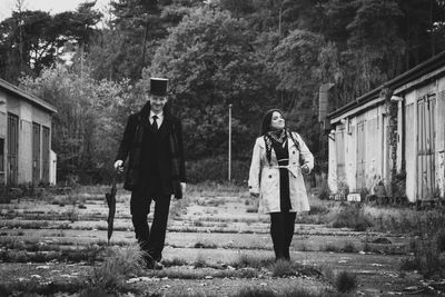 Old-fashioned couple walking outdoors