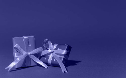 Close-up of gift box on blue background