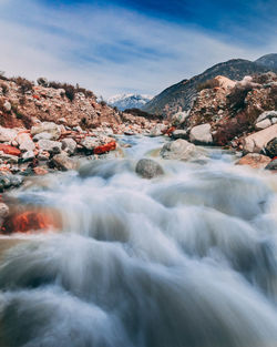 Scenic view of river against sky