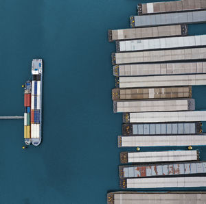 High angle view of stack of pier by sea