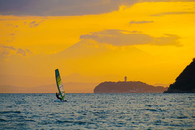 Scenic view of sea against sky during sunset