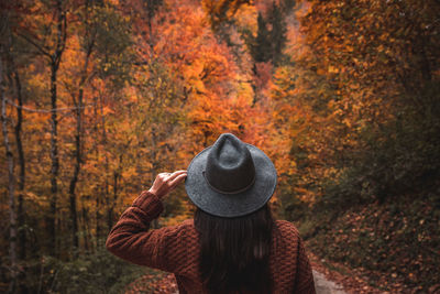 Portrait of man in forest during autumn