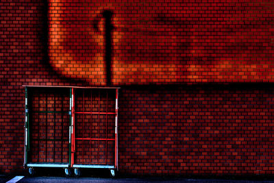 Red brick wall at night