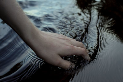 Human hand in water