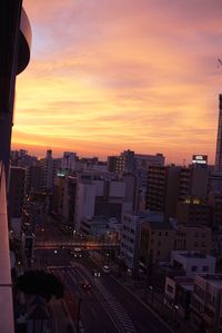 High angle shot of cityscape at sunset