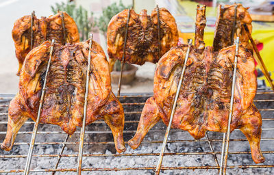 Close-up of meat on barbecue grill