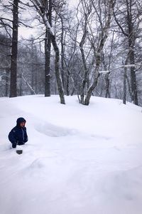 Rear view of man in snow