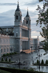 View of buildings against cloudy sky