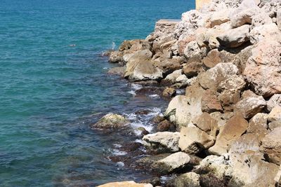 High angle view of rocks on beach