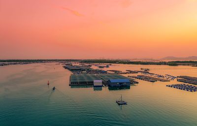 High angle view of sea against sky during sunset