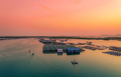 High angle view of sea against sky during sunset