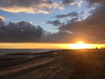 Scenic view of sea at sunset