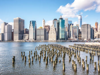 Modern buildings in city against sky