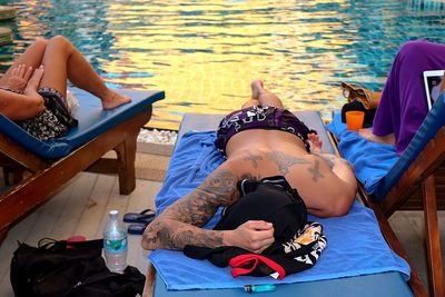 Woman relaxing in swimming pool