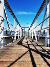 View of bridge against blue sky