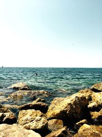 Scenic view of sea against clear sky