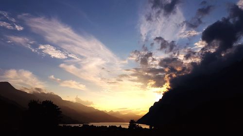 Scenic view of mountains at sunset