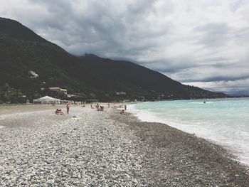 Scenic view of sea against mountains