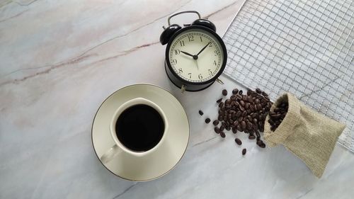 High angle view of coffee cup on table