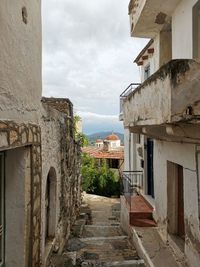 Narrow alley amidst old buildings in town