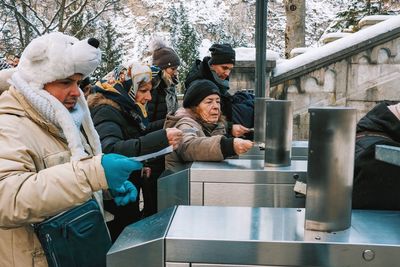 People standing in snow