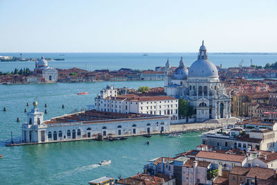 View of buildings in city at waterfront