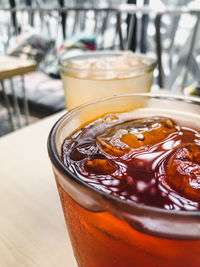 Close-up of coffee in glass on table