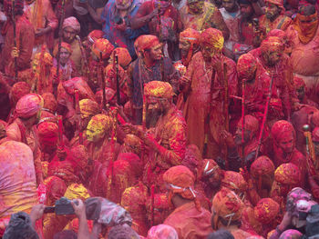 High angle view of people on multi colored flowers