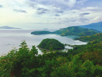 Scenic view of landscape and mountains against sky