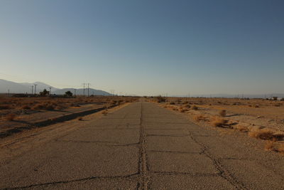 Road against clear sky