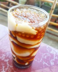 Close-up of beer in glass on table