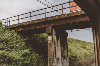 Low angle view of bridge against sky