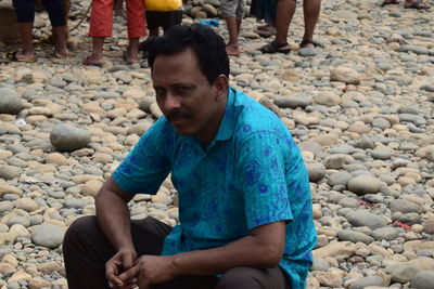 Man sitting on rocks