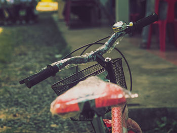 Close-up of new bicycle parked at backyard