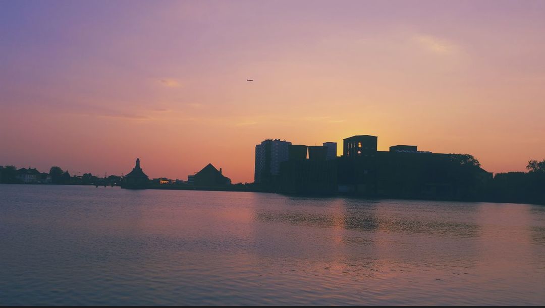 VIEW OF RIVER AT SUNSET