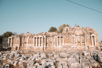 Old ruins of temple against clear sky