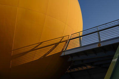 Orange round building in japan.