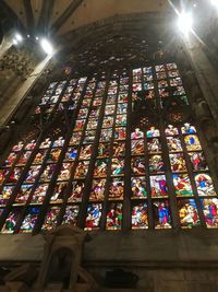 Low angle view of illuminated ceiling