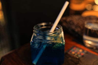 Close-up of drink in jar on table