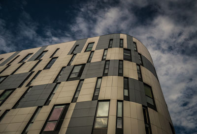 Low angle view of modern building against sky