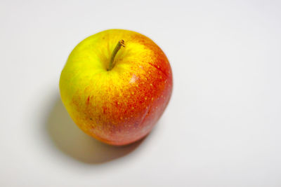 Close-up of apple against white background