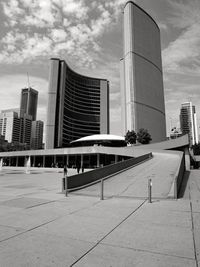 Modern buildings in city against sky