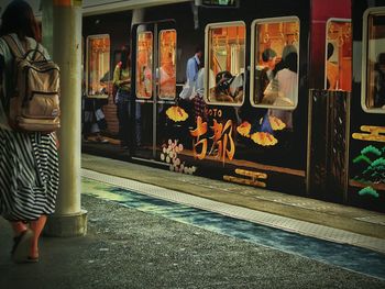 Woman standing at night