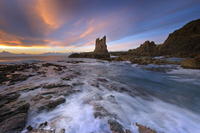 Scenic view of sea against sky during sunset