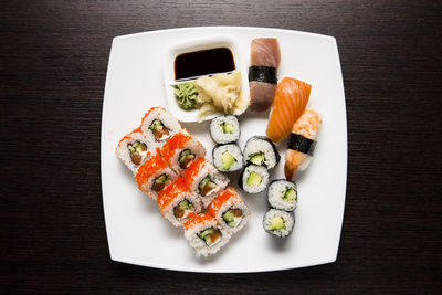 Directly above shot of sushi served on table