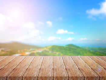 Close-up of wood against sky